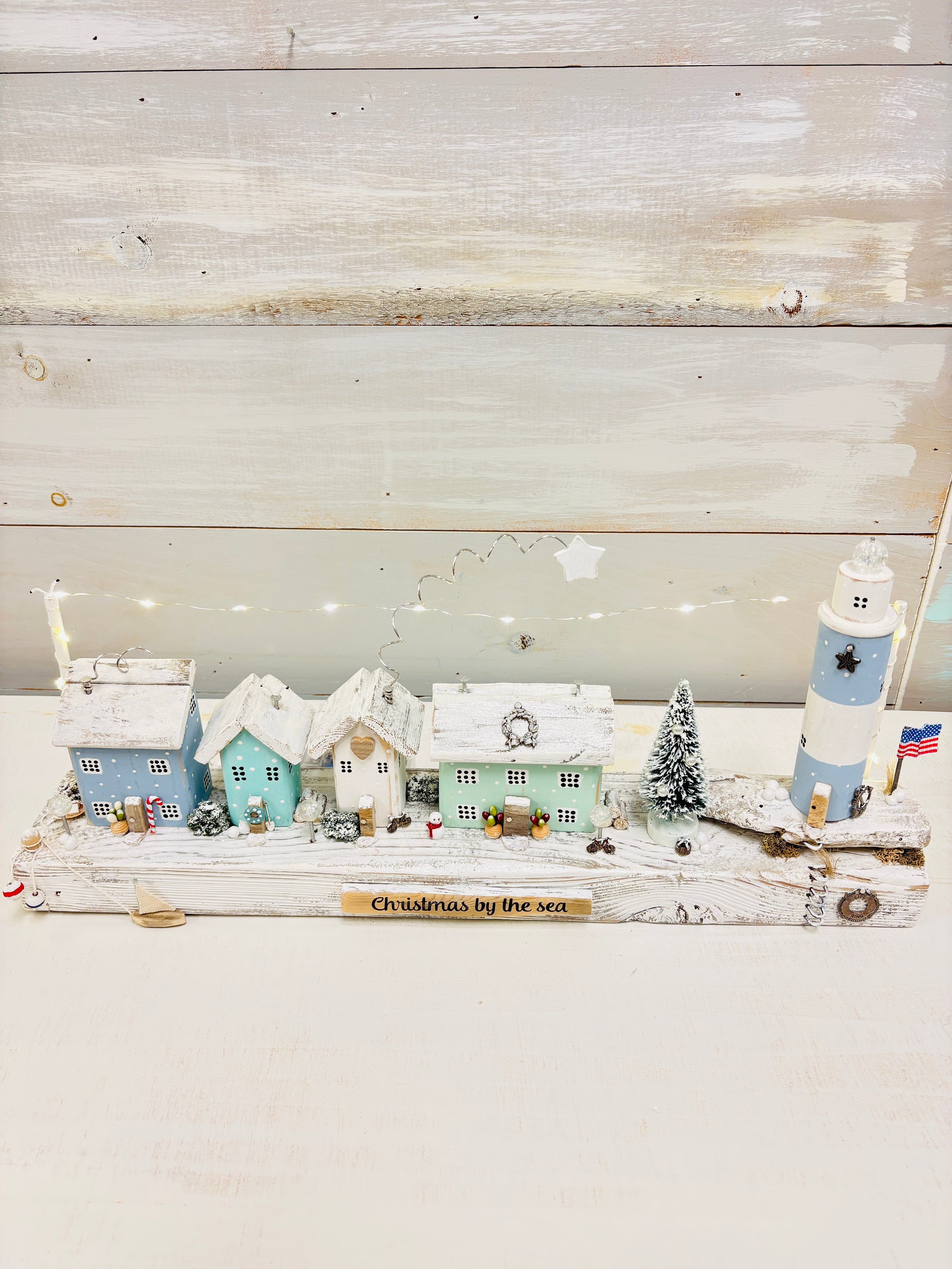Christmas By The Sea Winter Cottage and Lighthouse Scene on Driftwood w/ String Lights
