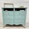 Coastal Inspired 6 Drawer Dresser w/ 2 Cubbies and Mounted Electrical Strip