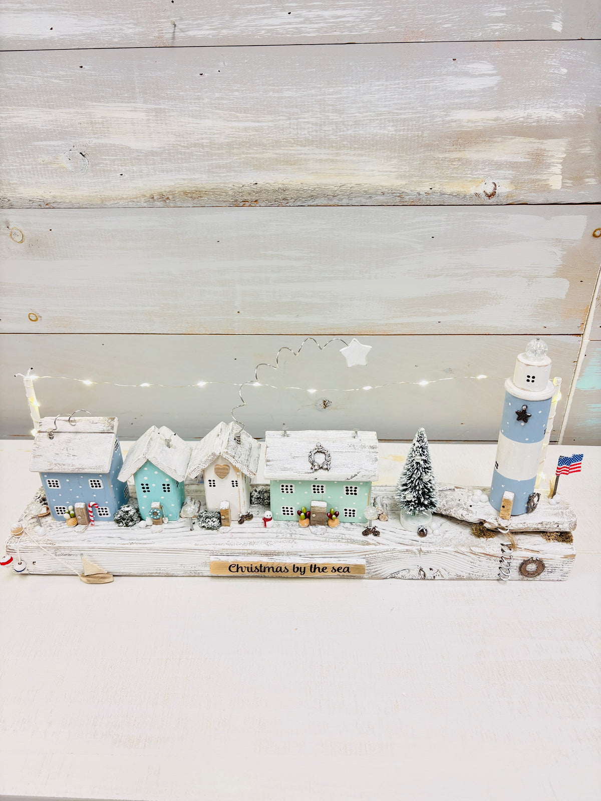 Christmas By The Sea Winter Cottage and Lighthouse Scene on Driftwood w/ String Lights