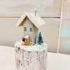 Assorted Winter Wooden Cottages on Driftwood Base