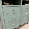 Coastal Inspired 6 Drawer Dresser w/ 2 Cubbies and Mounted Electrical Strip