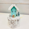 Assorted Winter Wooden Cottages on Driftwood Base