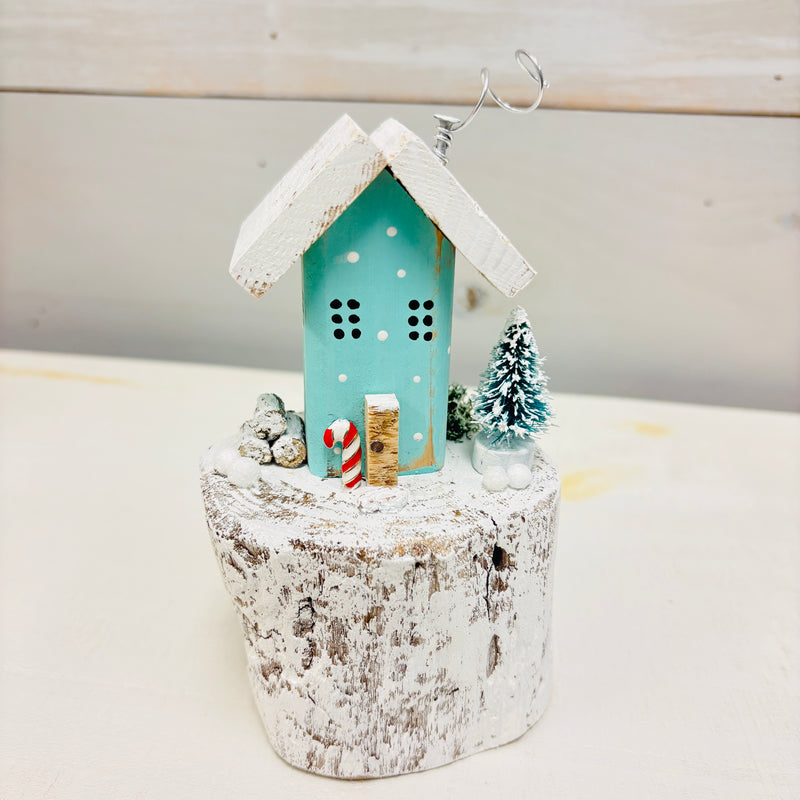 Assorted Winter Wooden Cottages on Driftwood Base