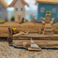 Driftwood Lighthouse Coastal Scene