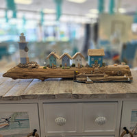 Driftwood Lighthouse Coastal Scene
