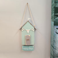 Hanging Wooden Beach Houses